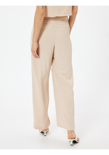 Kruvaze Detaylı Bol Paça Pantolon Aerobin Kumaş fırsatları