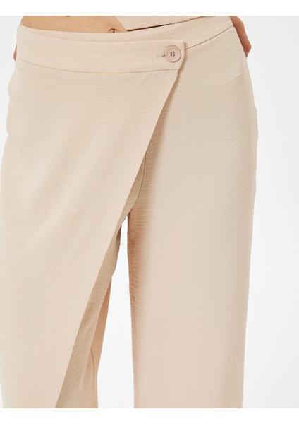 Kruvaze Detaylı Bol Paça Pantolon Aerobin Kumaş indirimleri