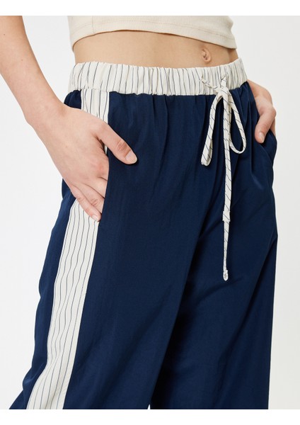 Paraşüt Pantolon Beli Bağcıklı Geniş Paça Cep Detaylı