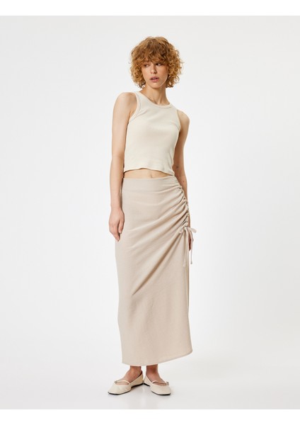 Uzun Etek Yırtmaçlı Büzgülü A Kesim Standart Bel fiyatları