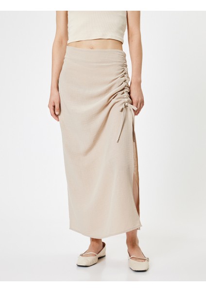 Uzun Etek Yırtmaçlı Büzgülü A Kesim Standart Bel modelleri