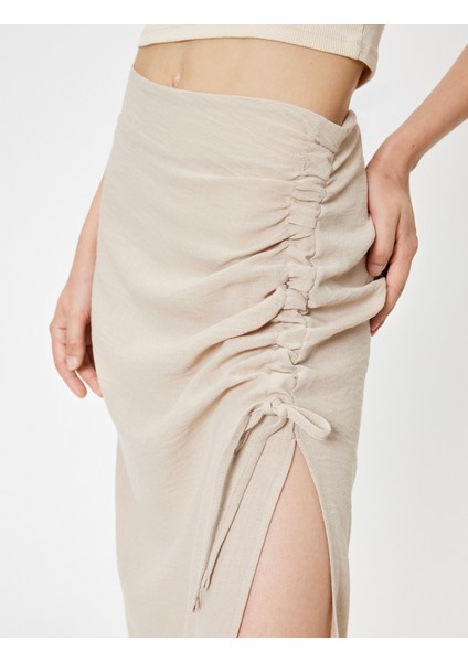 Uzun Etek Yırtmaçlı Büzgülü A Kesim Standart Bel indirimleri