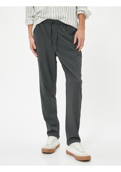 Chino Pantolon Slim Fit Beli Bağcıklı Katlamalı Paça Cep Detaylı modelleri