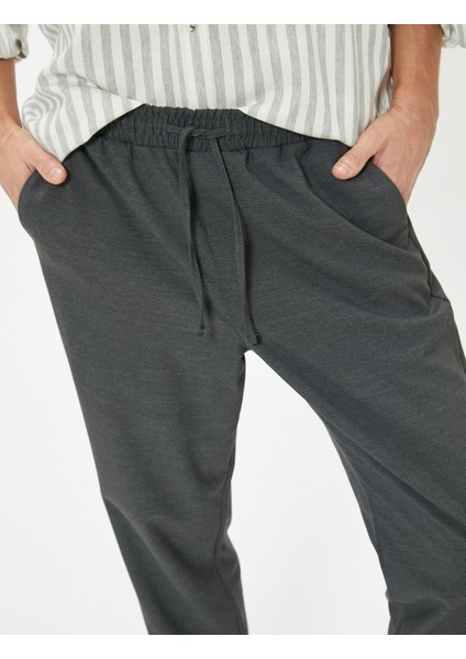 Chino Pantolon Slim Fit Beli Bağcıklı Katlamalı Paça Cep Detaylı indirimleri