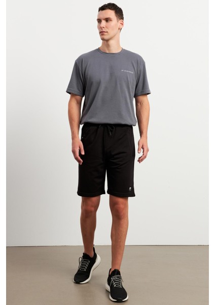 6000 Erkek Şort Esnek Tasarım ve Modern Stil ile Rahat Spor Deneyimi Sunar fiyatları