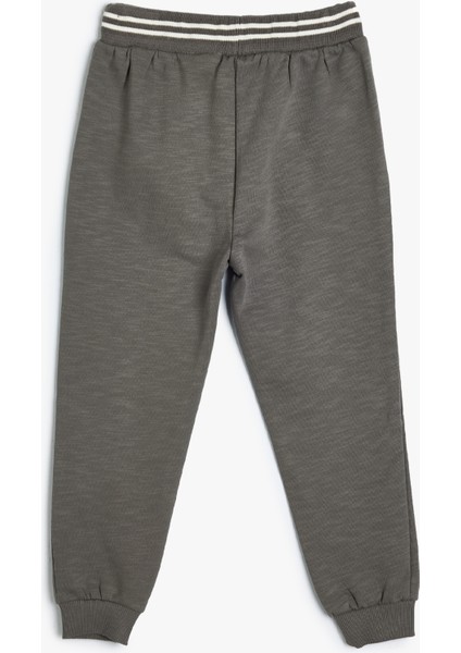 Jogger Eşofman Altı Beli Bağlamalı Slogan Baskılı Pamuklu Şardonlu fiyatları