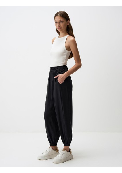 Siyah Beli Lastikli Dar Paça Cepli Pantolon