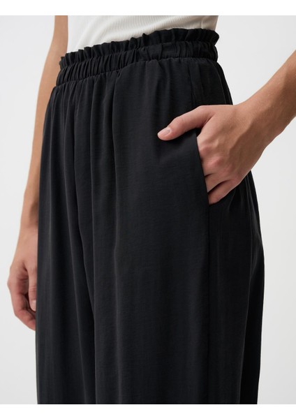 Siyah Beli Lastikli Dar Paça Cepli Pantolon