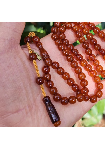 7 mm 99 Habbe Kahverengi Sıkma Kehribar Tesbih - Ebu Sırr Imzalı Namaz Tesbihi fiyatları