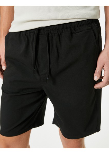 Slim Fit Şort Bermuda Beli Bağcıklı Cep Detaylı indirimleri