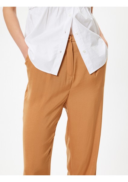 Havuç Kesim Kumaş Pantolon Aerobin Saten Cepli Pile Detaylı indirimleri