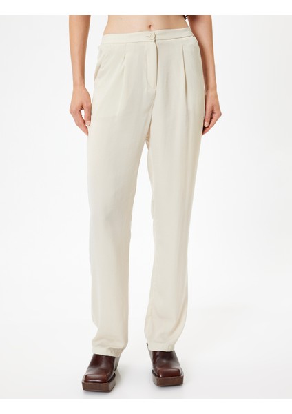 Havuç Kesim Kumaş Pantolon Aerobin Saten Cepli Pile Detaylı modelleri