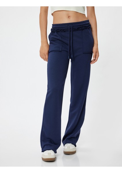 Oversize Eşofman Altı Bol Paça Beli Bağcıklı Fırfır Detaylı Cepli modelleri