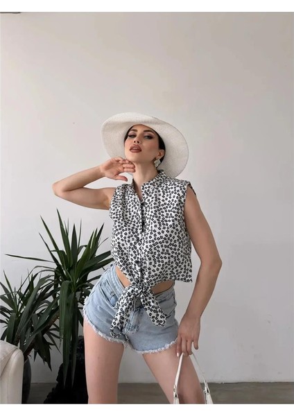 Kadın Hakim Yaka Düğmeli Çiçek Desenli Kolsuz Bağlama Detaylı Crop Gömlek Bluz fiyatları