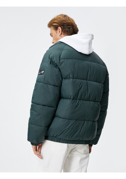 Şişme Mont Dik Yaka Fermuarlı Etiket Baskılı Cep Detaylı fırsatları