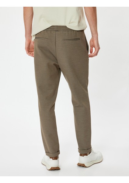 Beli Bağcıklı Pantolon Cep Detaylı Katlamalı Paça fırsatları