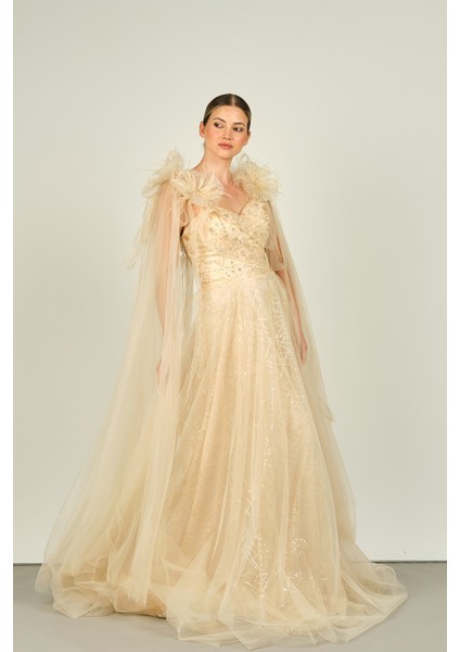 Kadın Kolu Tül ve Otrişli Fiyonk Süslemeli Uzun Abiye Elbise 4118 Şampanya modelleri