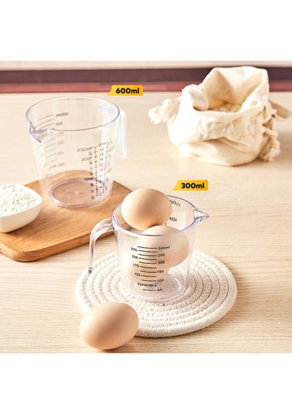 600ML 300/600/1000ML Ölçüm Kabı Şeffaf Isıya Dayanıklı Plastik Süt Su Ölçekli Ölçüm Kavanozu Mikrodalga Aracı Pişirme Için (Yurt Dışından) indirimleri