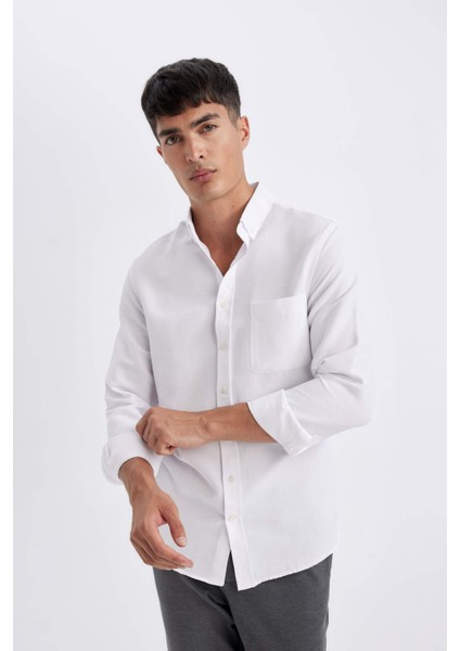 Slim Fit Dar Kesim Düğmeli Dokulu Düz Pamuk Karışımlı Uzun Kollu Beyaz Gömlek T2066AZ24AU modelleri