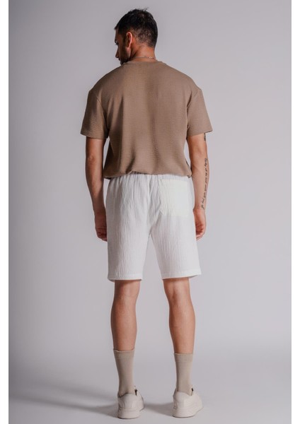 Erkek Yandan Cepli Beli Lastikli Dokulu Kumaş Relaxed Fit Jogger Şort Ekru modelleri