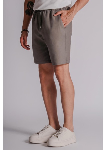 Erkek Yandan Cepli Beli Lastikli Keten Dokulu Relaxed Fit Jogger Şort Haki fırsatları