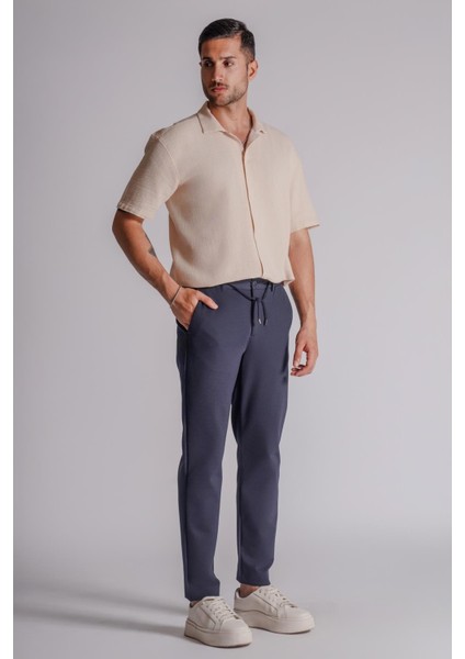 Erkek Yandan Cepli Beli Lastikli Relaxed Fit Chino Pantolon Lacivert fiyatları