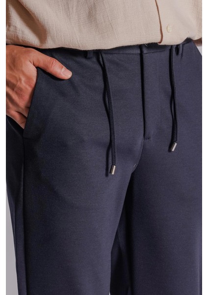 Erkek Yandan Cepli Beli Lastikli Relaxed Fit Chino Pantolon Lacivert fırsatları