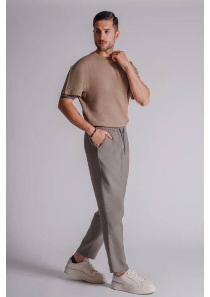 Erkek Yandan Cepli Beli Lastikli Keten Dokulu Relaxed Fit Jogger Pantolon Haki fiyatları