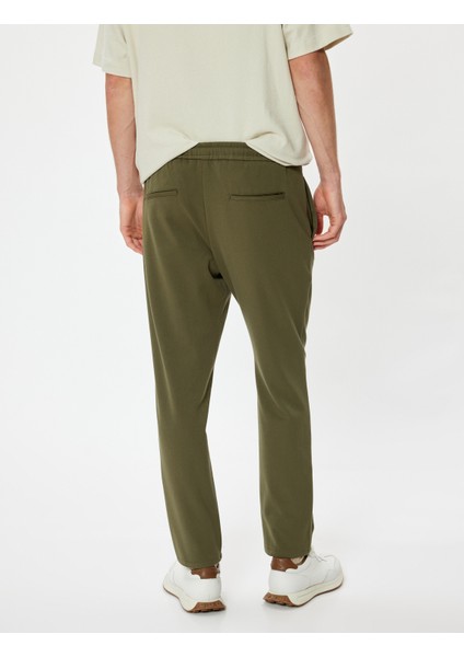 Beli Bağcıklı Pantolon Cep Detaylı fırsatları