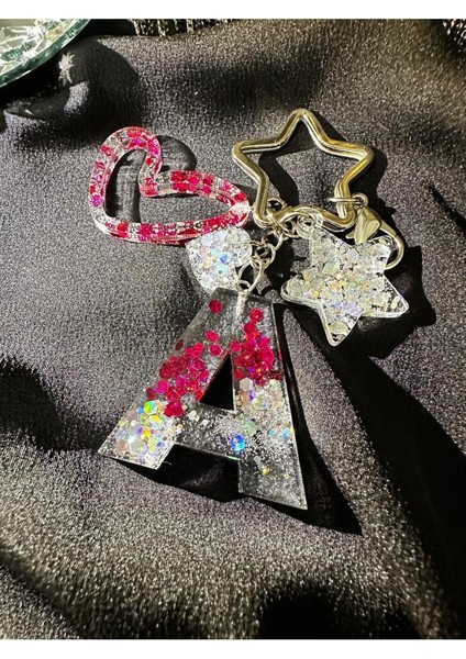 A Harf Antrasit Gri Renk Fuşya Glitter Yıldız Kancalı Vıp Ekstra Figürlü Epoksi Harf Anahtarlık fiyatları