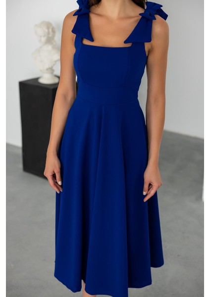 Kadın Krep Kumaş Kare Yaka Omuzda Fiyonk Detaylı Midi Boy Elbise indirimleri