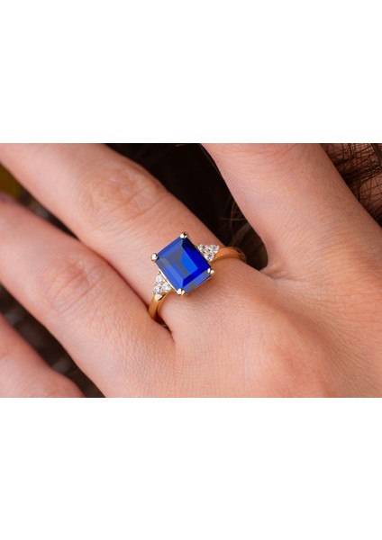 14 Ayar Kenarları Yuvarlak Taşlı Lacivert Baget Kesim Yüzük