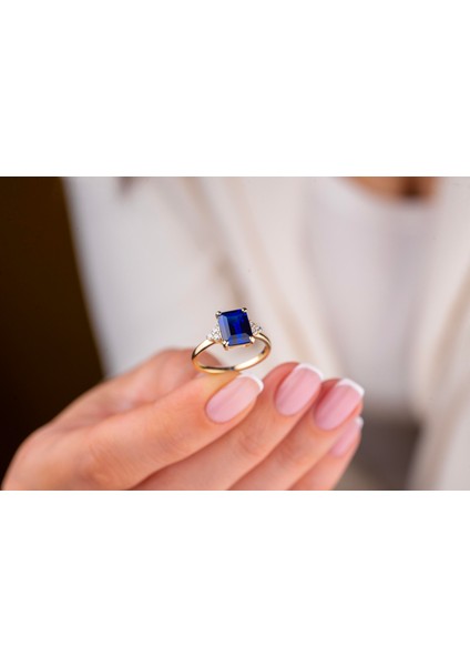 14 Ayar Kenarları Yuvarlak Taşlı Lacivert Baget Kesim Yüzük indirimleri