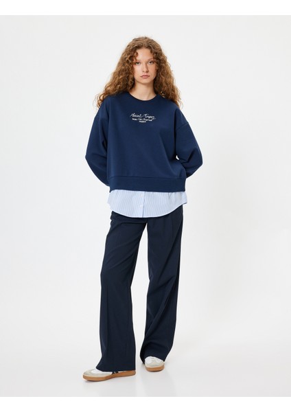 Oversize Sweatshirt Bisiklet Yaka Sloganlı Kumaş Detaylı fiyatları