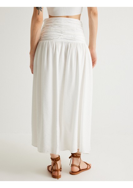 x Melis Ağazat Midi Boy Kloş Etek Drape Detaylı Viskon Kumaş fırsatları