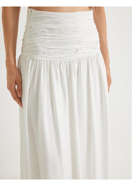 x Melis Ağazat Midi Boy Kloş Etek Drape Detaylı Viskon Kumaş indirimleri