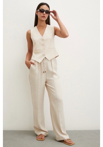 Belden Bağlamalı Pantolon Bej modelleri