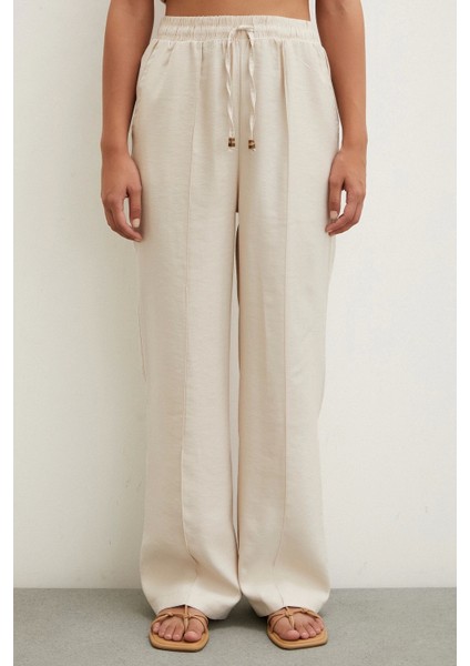 Belden Bağlamalı Pantolon Bej fırsatları