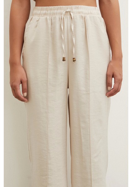 Belden Bağlamalı Pantolon Bej indirimleri