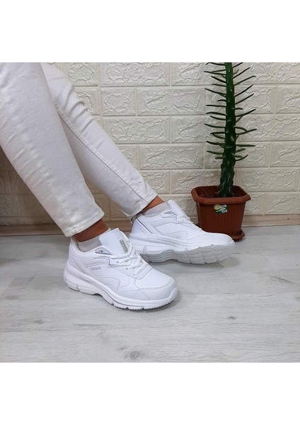 Melly Pu Beyaz Fuspetli Dolgu Topuk Bayan Spor Ayakkabı