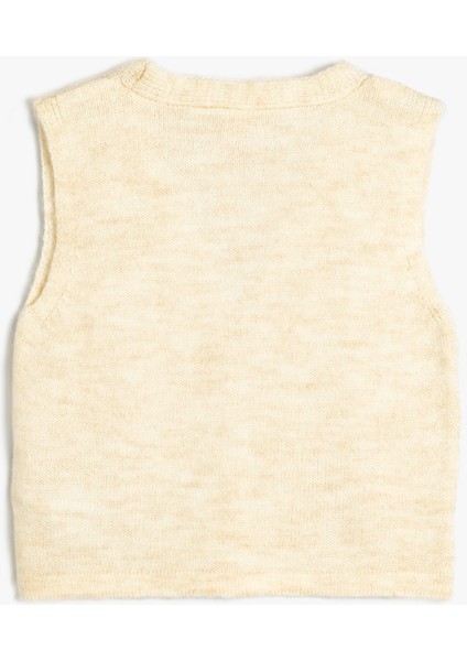 Kız Çocuk Kolsuz Basic Yelek Çiçek Aplikeli V Yaka Bej Renkli Şık Tasarım fiyatları