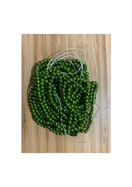 3mm Inci Boncuk 2'li Dizi. Renk: Metalik Yeşil. Takribrn 620-640 Adet.