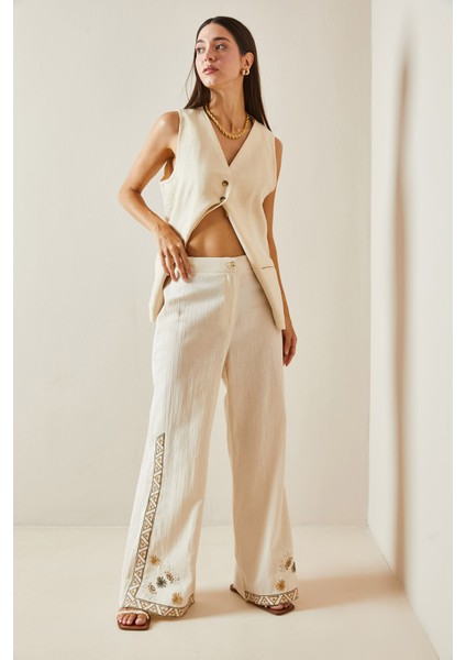 Bej Nakışlı Bol Paça Keten Pantolon 5YXK5-48875-25 fırsatları
