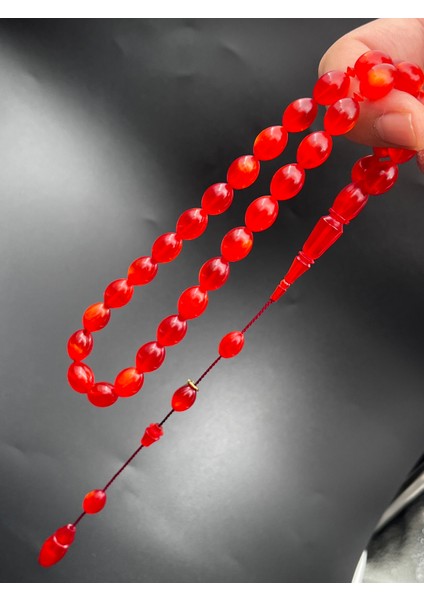 Sıkma Kehribar Tesbih Özel Kızıl Sedefli Arpa Model 9X12MM 33 Tane Sistemli Püskül SK010196.040824 fiyatları