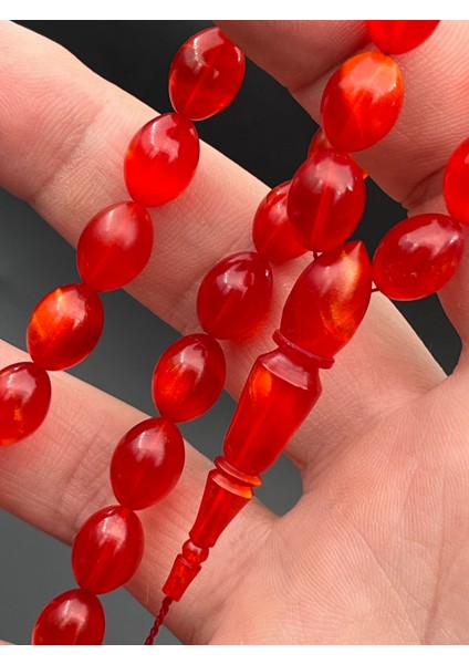 Sıkma Kehribar Tesbih Özel Kızıl Sedefli Arpa Model 9X12MM 33 Tane Sistemli Püskül SK010196.040824 modelleri