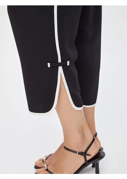 Renk Bloklu Paçası Metal Aksesuarlı Caprı 69468 indirimleri