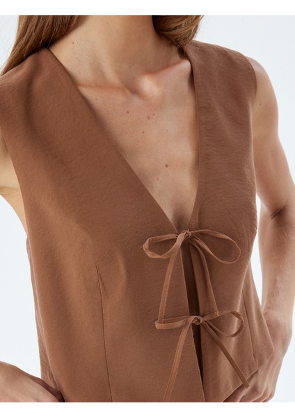 Fiyonklu Önü Bağcıklı Crop Yelek V Yaka Modal Kumaş indirimleri