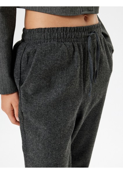 Jogger Pantolon Beli Bağcıklı Cep Detaylı Kırçıllı