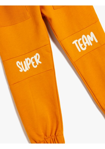 Jogger Eşofman Altı Beli Bağlamalı Slogan Baskılı Pamuklu modelleri