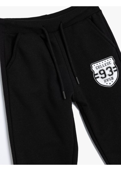 Jogger Eşofman Altı Kolej Baskılı Beli Bağlamalı Cepli modelleri